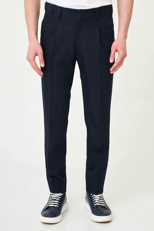 Navy Blue slim-fit straight-leg pleated trousers for men, styled with dark bluw sneakers, ideal for summer business and formal occasions.