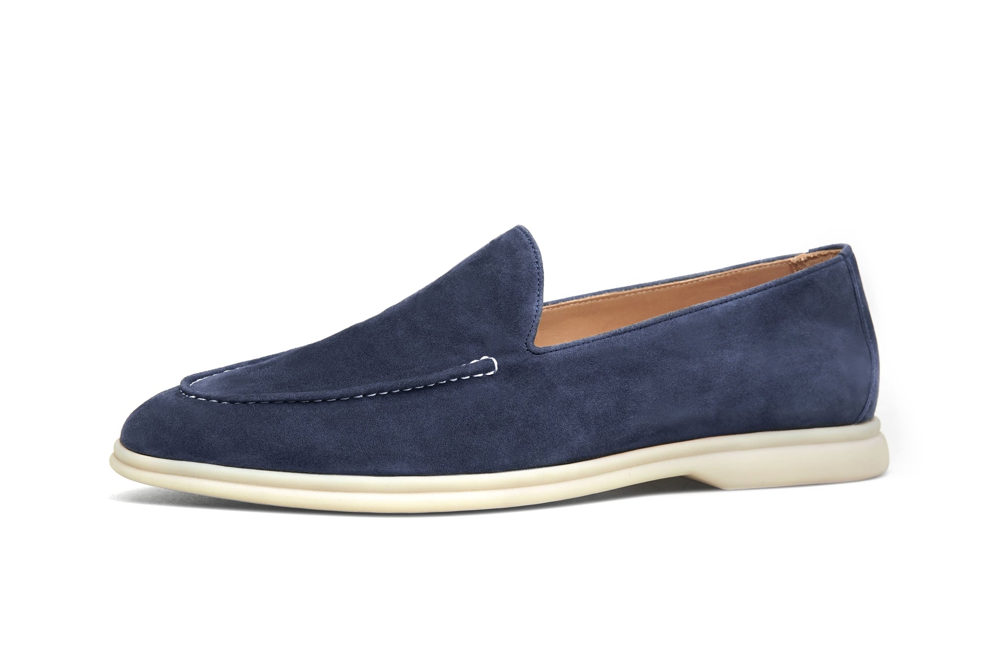 Men’s navy blue suede leather casual slip-on loafers with moccasin stitching and lightweight sole.