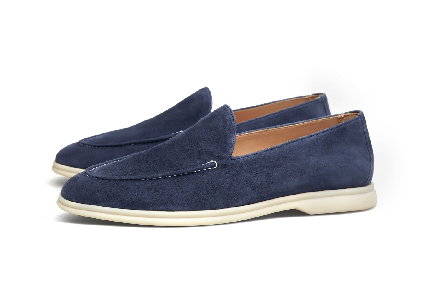 Men’s navy blue suede leather casual slip-on loafers with moccasin stitching and lightweight sole.