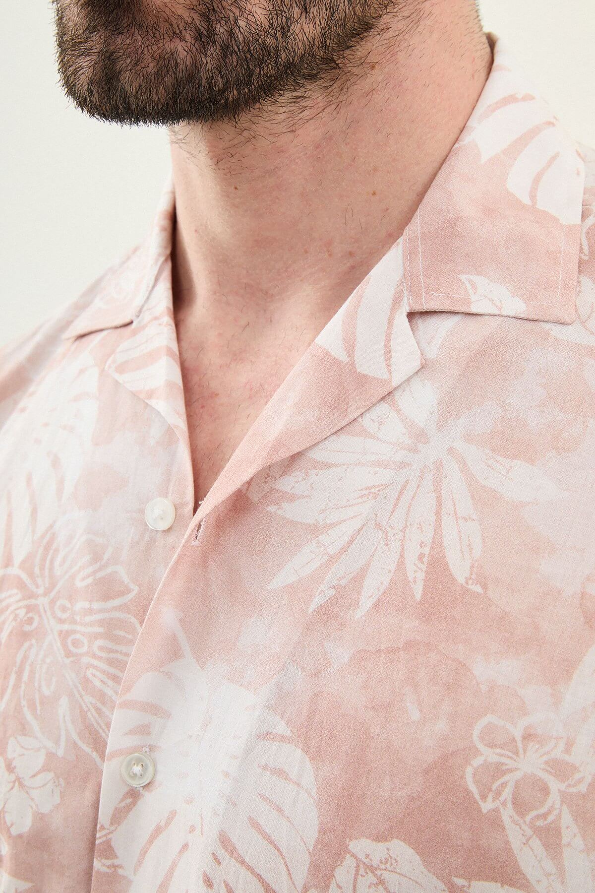 Men’s pink tropical print short sleeve shirt crafted from lightweight 100% cotton, designed for relaxed summer and resort styling.