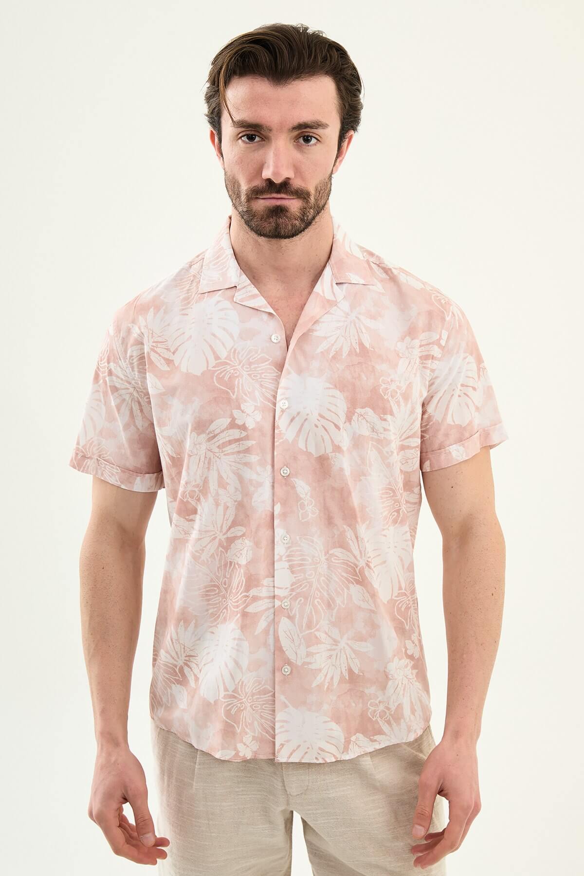 Men’s pink tropical print short sleeve shirt crafted from lightweight 100% cotton, designed for relaxed summer and resort styling.