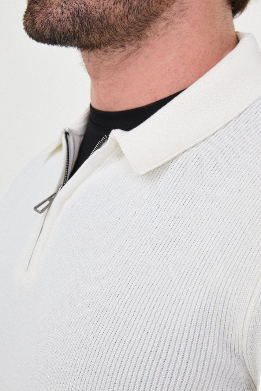 Men’s ecru polo collar knit sweater with zip neckline detail and cotton stretch ribbed fabric for fall winter smart casual style.