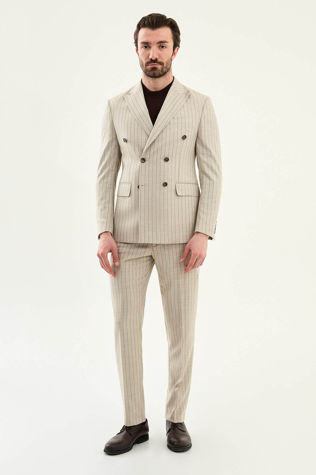Men’s beige slim fit double-breasted pinstripe suit jacket crafted from a cotton-viscose stretch blend for elegant formal and smart occasion wear.
