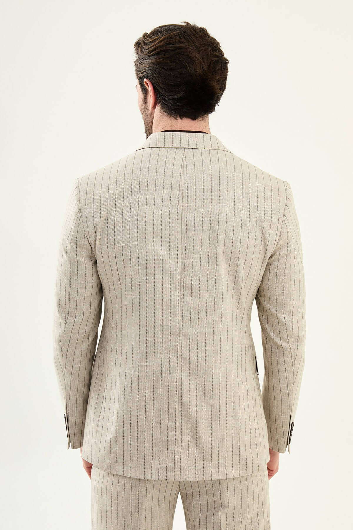 Men’s beige slim fit double-breasted pinstripe suit jacket crafted from a cotton-viscose stretch blend for elegant formal and smart occasion wear.