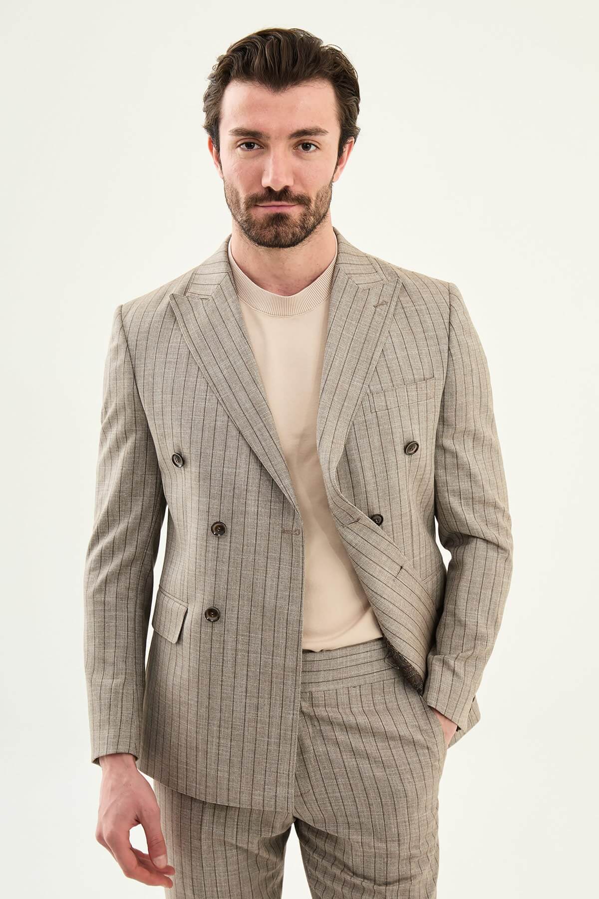 Men’s brown slim fit double-breasted pinstripe suit jacket crafted from a cotton-viscose stretch blend for modern formal and smart occasion wear.