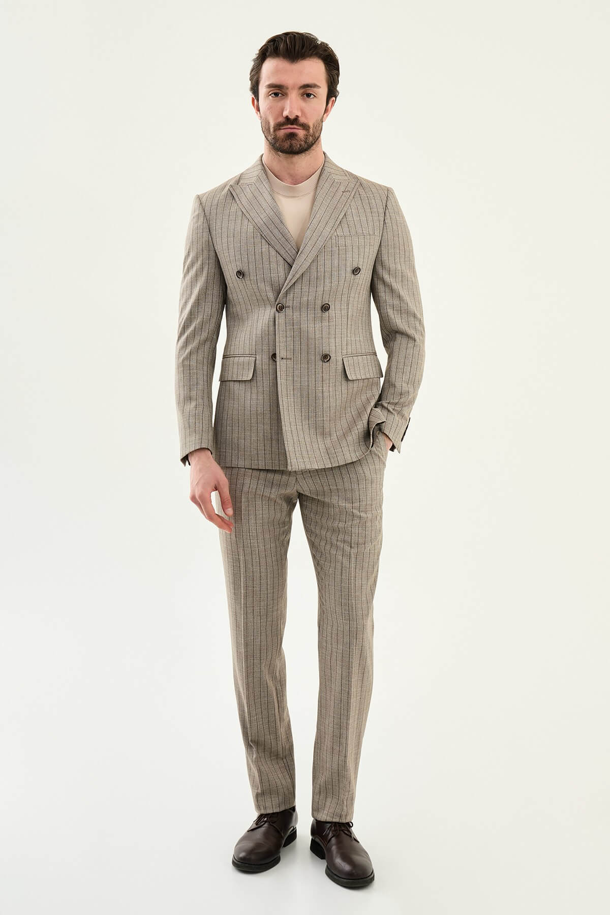 Men’s brown slim fit double-breasted pinstripe suit jacket crafted from a cotton-viscose stretch blend for modern formal and smart occasion wear.