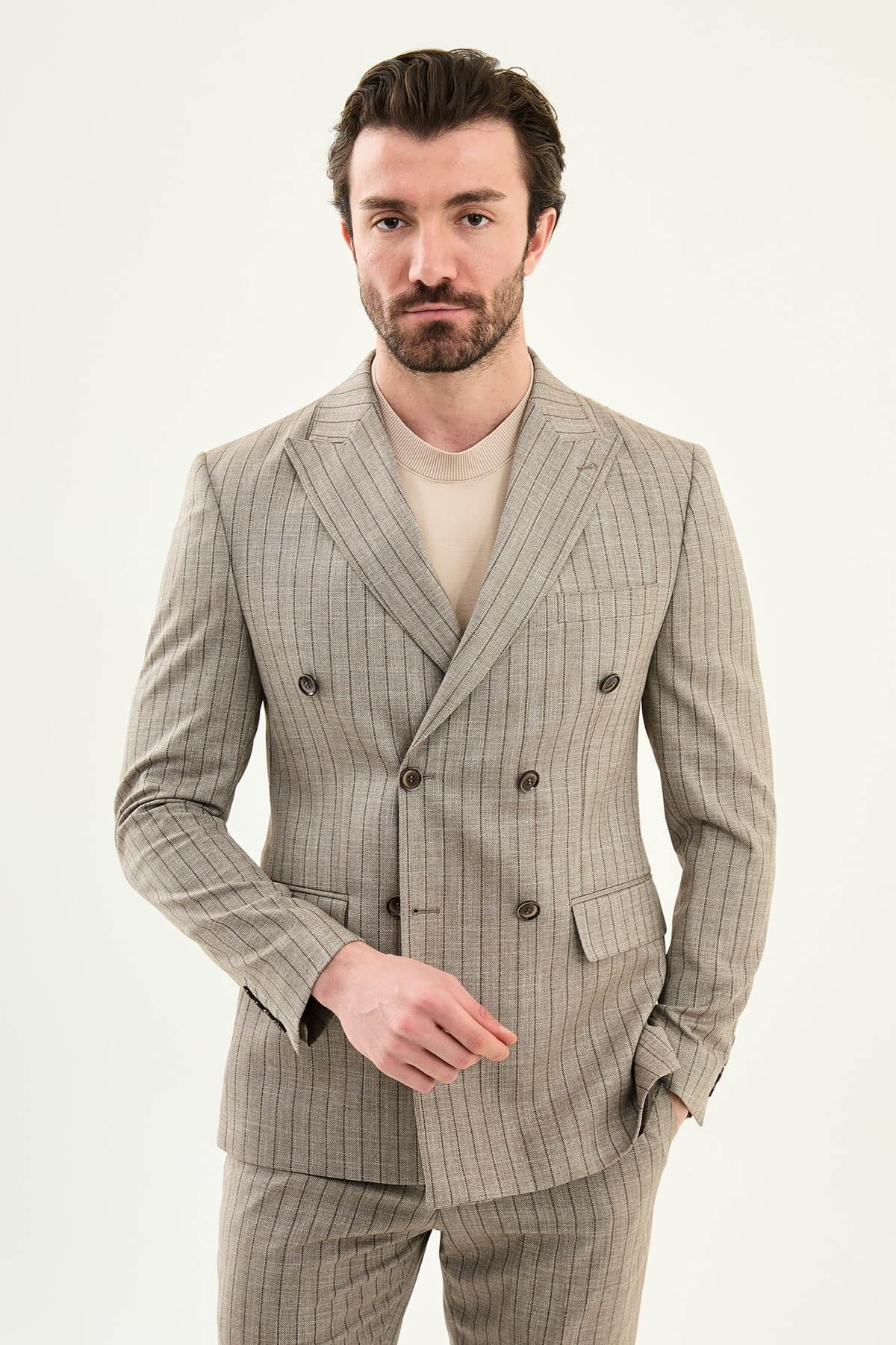 Men’s brown slim fit double-breasted pinstripe suit jacket crafted from a cotton-viscose stretch blend for modern formal and smart occasion wear.