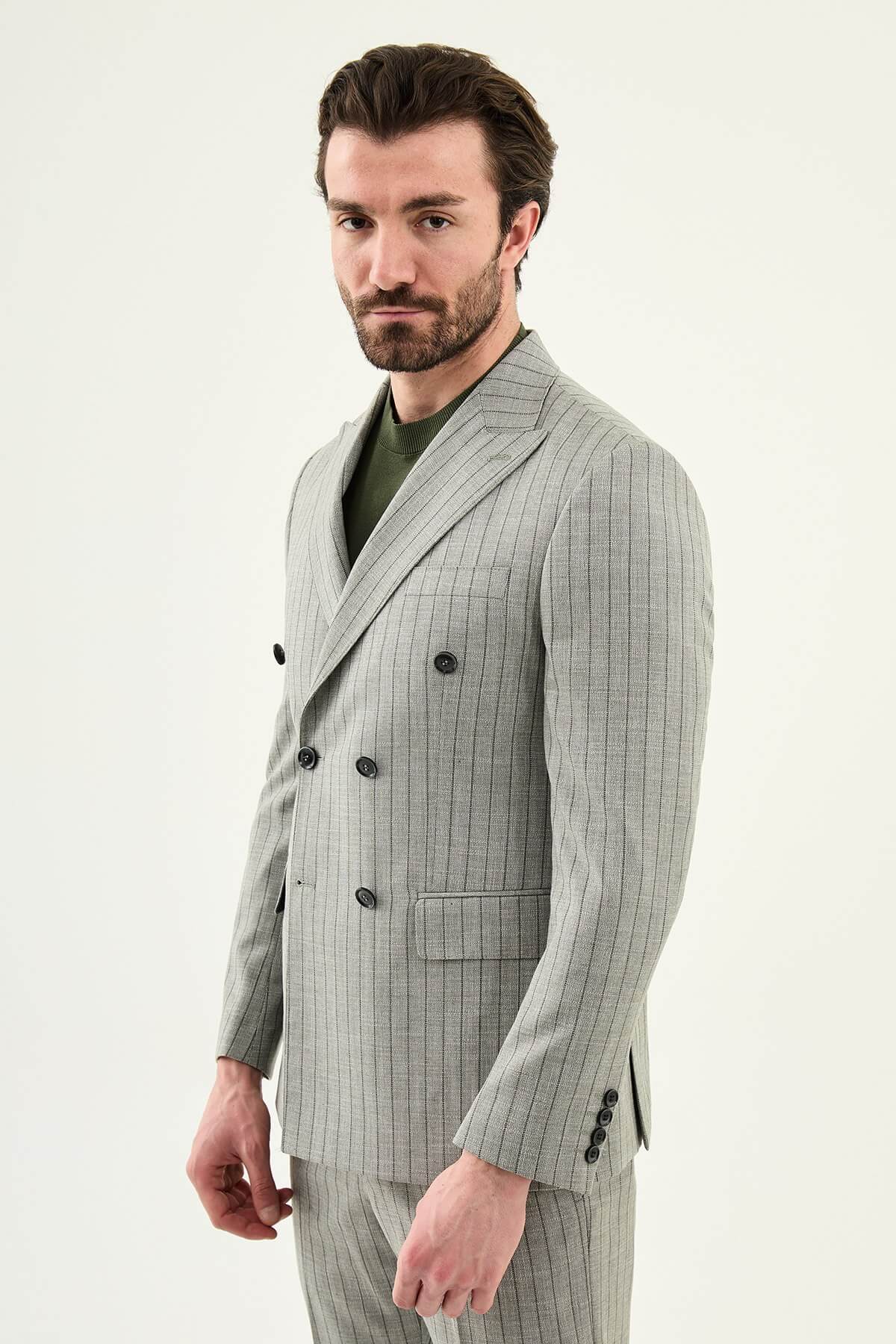 Men’s khaki slim fit double-breasted pinstripe suit jacket crafted from a cotton-viscose stretch blend for modern formal and smart occasion styling.