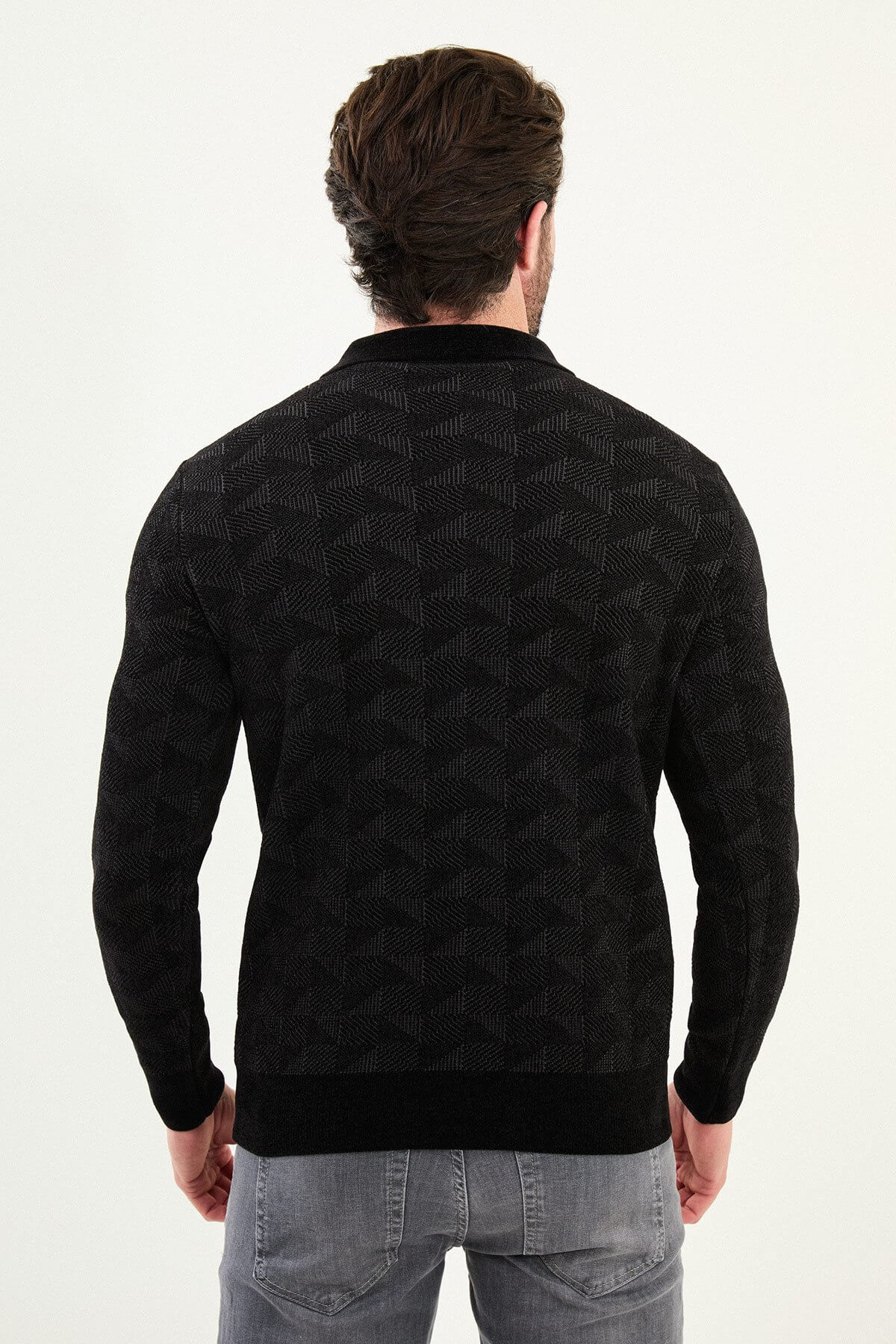 Men’s black textured zip polo sweater with geometric knit pattern, slim fit smart casual knit styled with gray jeans