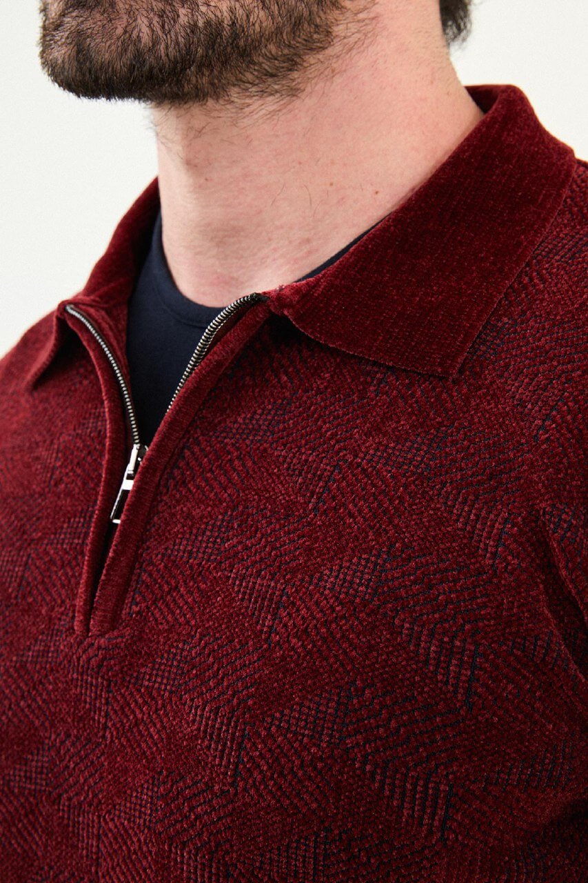 Men’s burgundy textured zip polo sweater with geometric knit pattern, slim fit smart casual knit styled with blue jeans