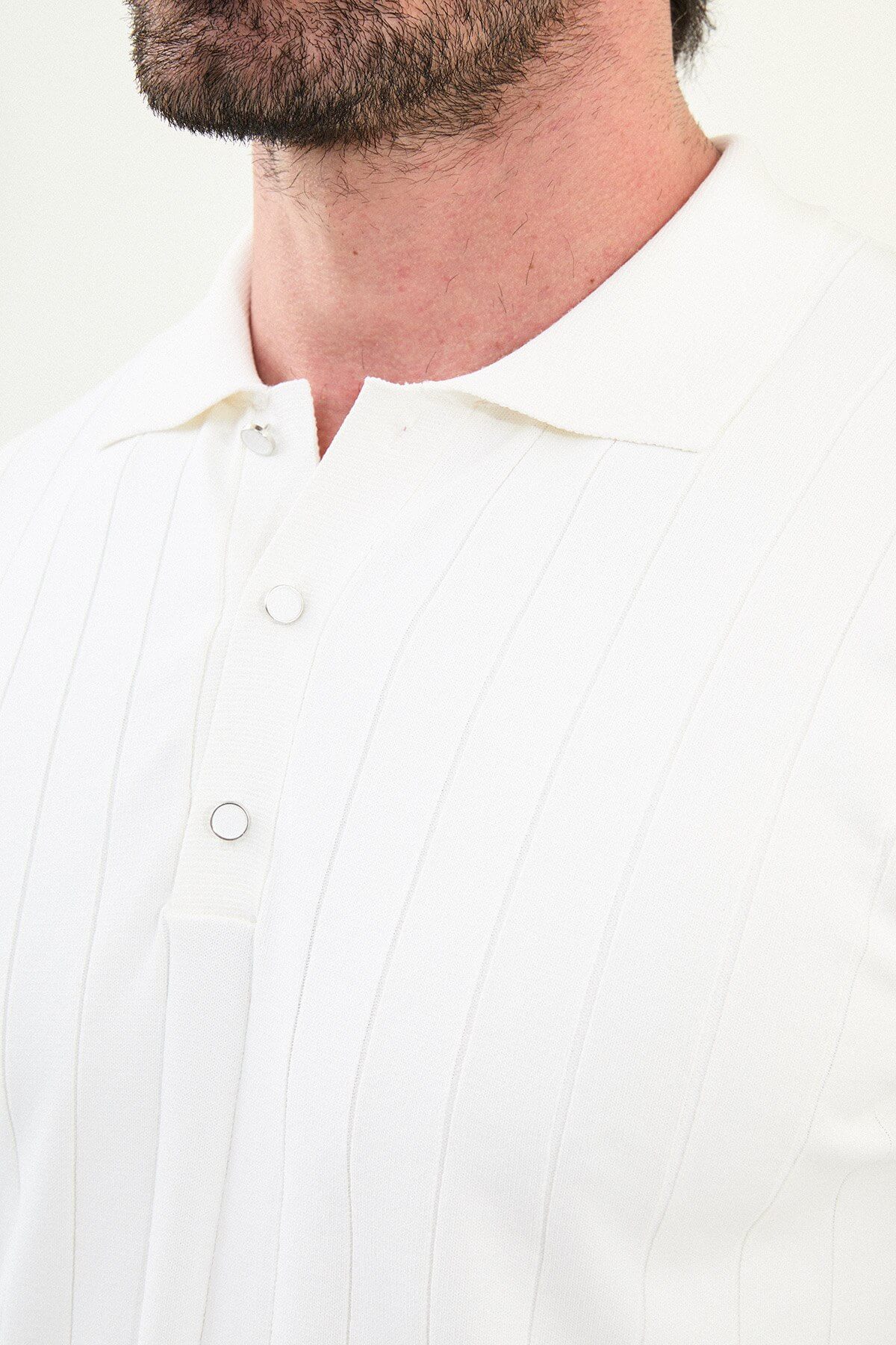 Men’s ecru ribbed polo sweater with vertical knit pattern, slim fit smart casual knit styled with blue jeans