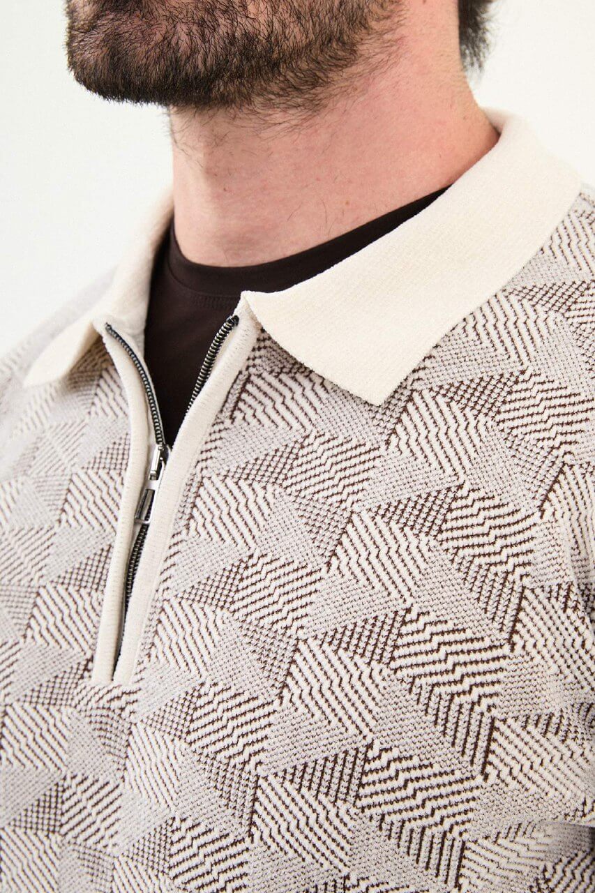 Men’s ecru textured zip polo sweater with geometric knit pattern, slim fit neutral smart casual sweater styled with brown trousers