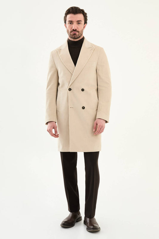 Beige double-breasted men’s coat styled with dark turtleneck sweater