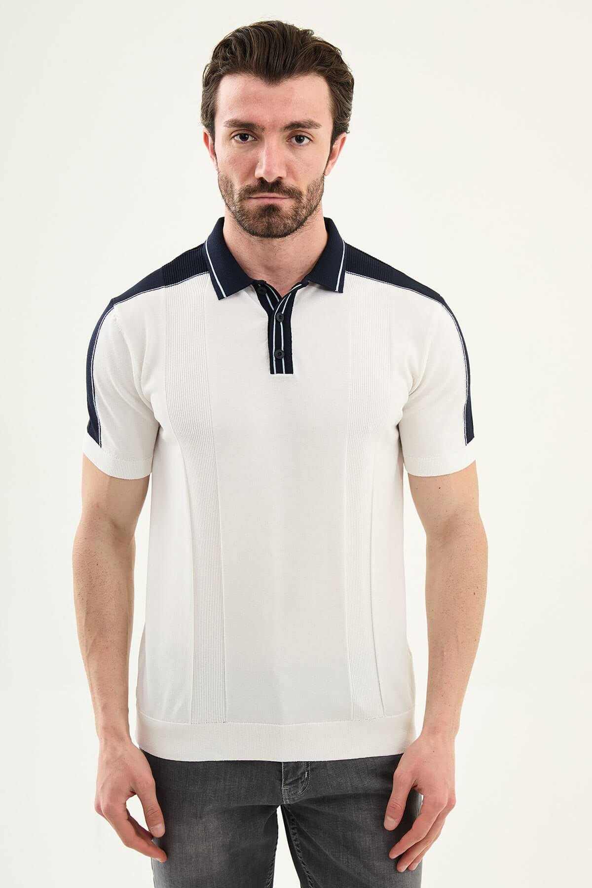 Men’s white colorblock slim fit knit polo shirt with contrast collar details styled for elegant summer smart-casual fashion.