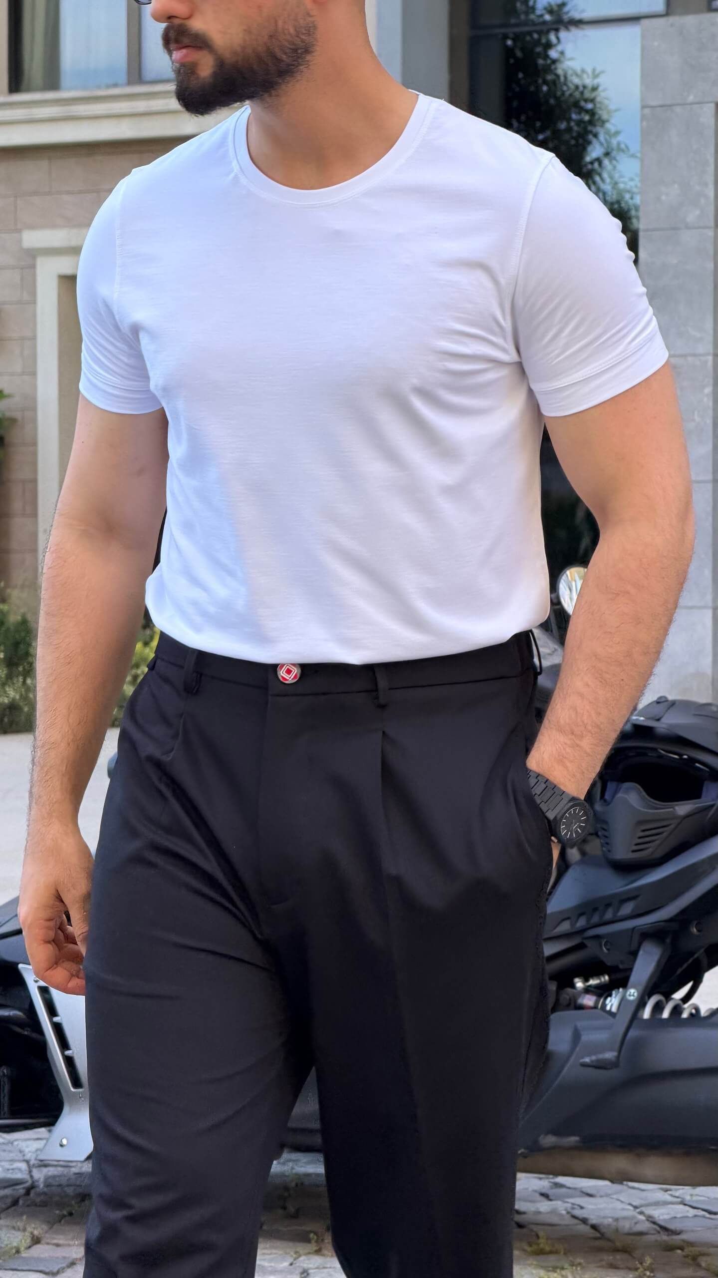 Ecru men’s crew neck t-shirt on model, soft cotton-viscose blend, comfortable slim fit casual essential.