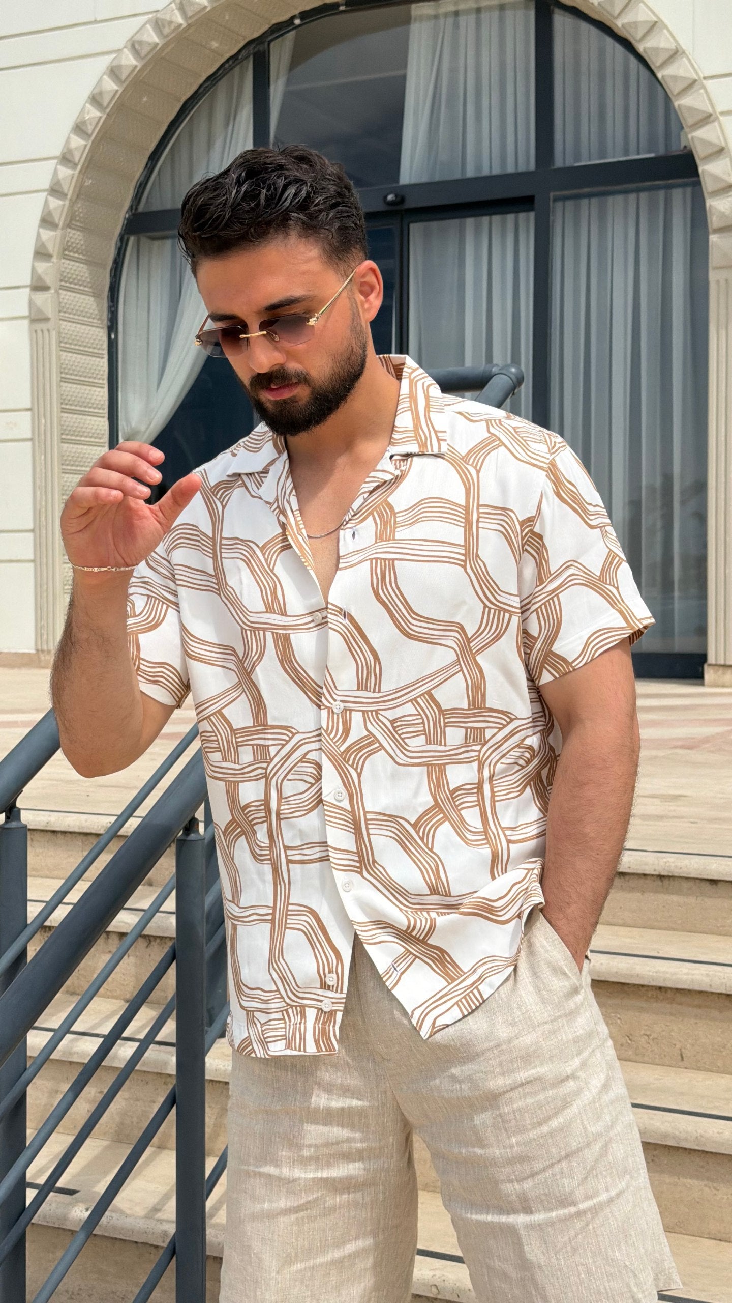 Men’s white brown abstract print short sleeve shirt with lightweight viscose fabric, button-front design, and modern summer casual style.