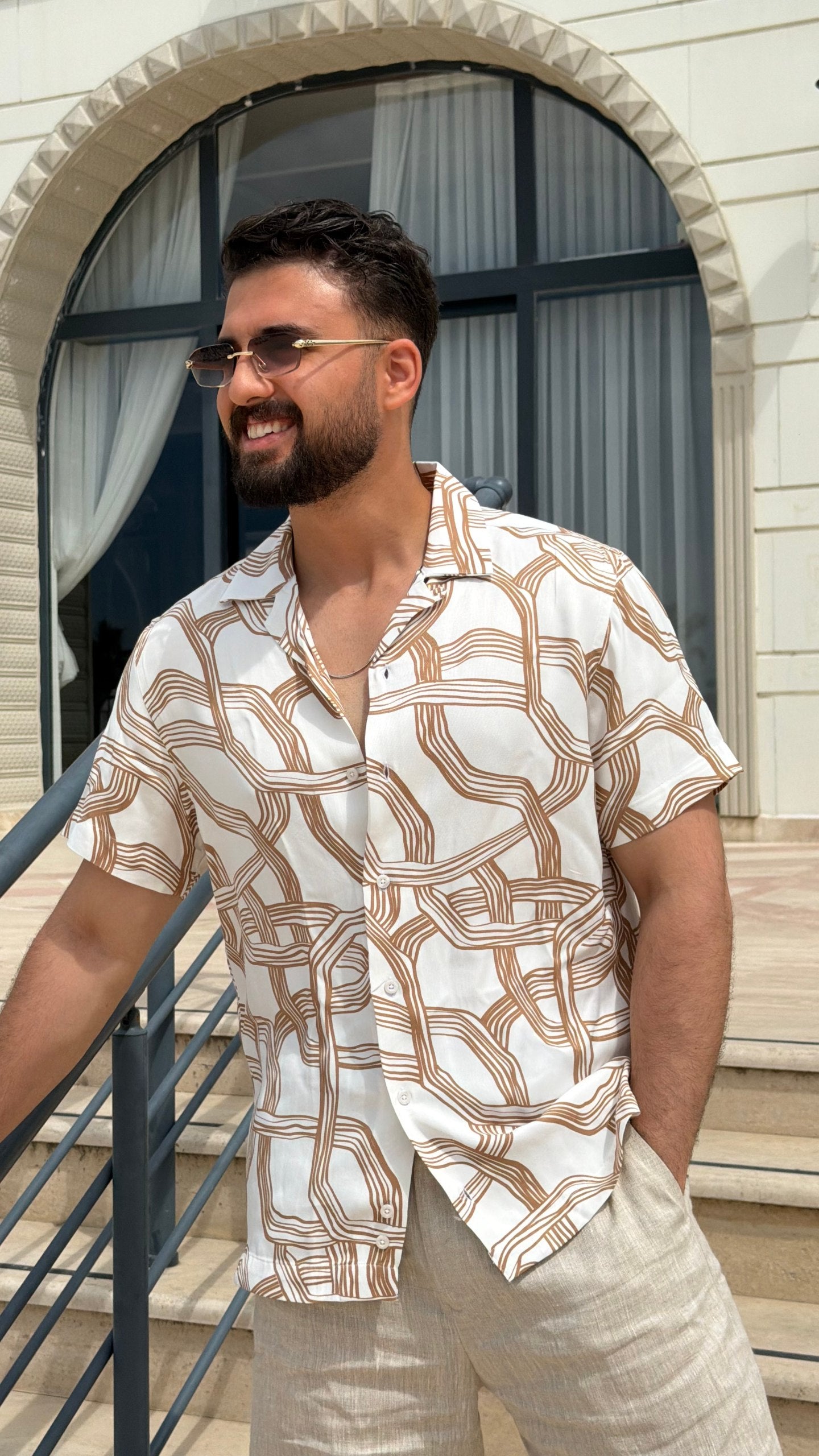Men’s white brown abstract print short sleeve shirt with lightweight viscose fabric, button-front design, and modern summer casual style.