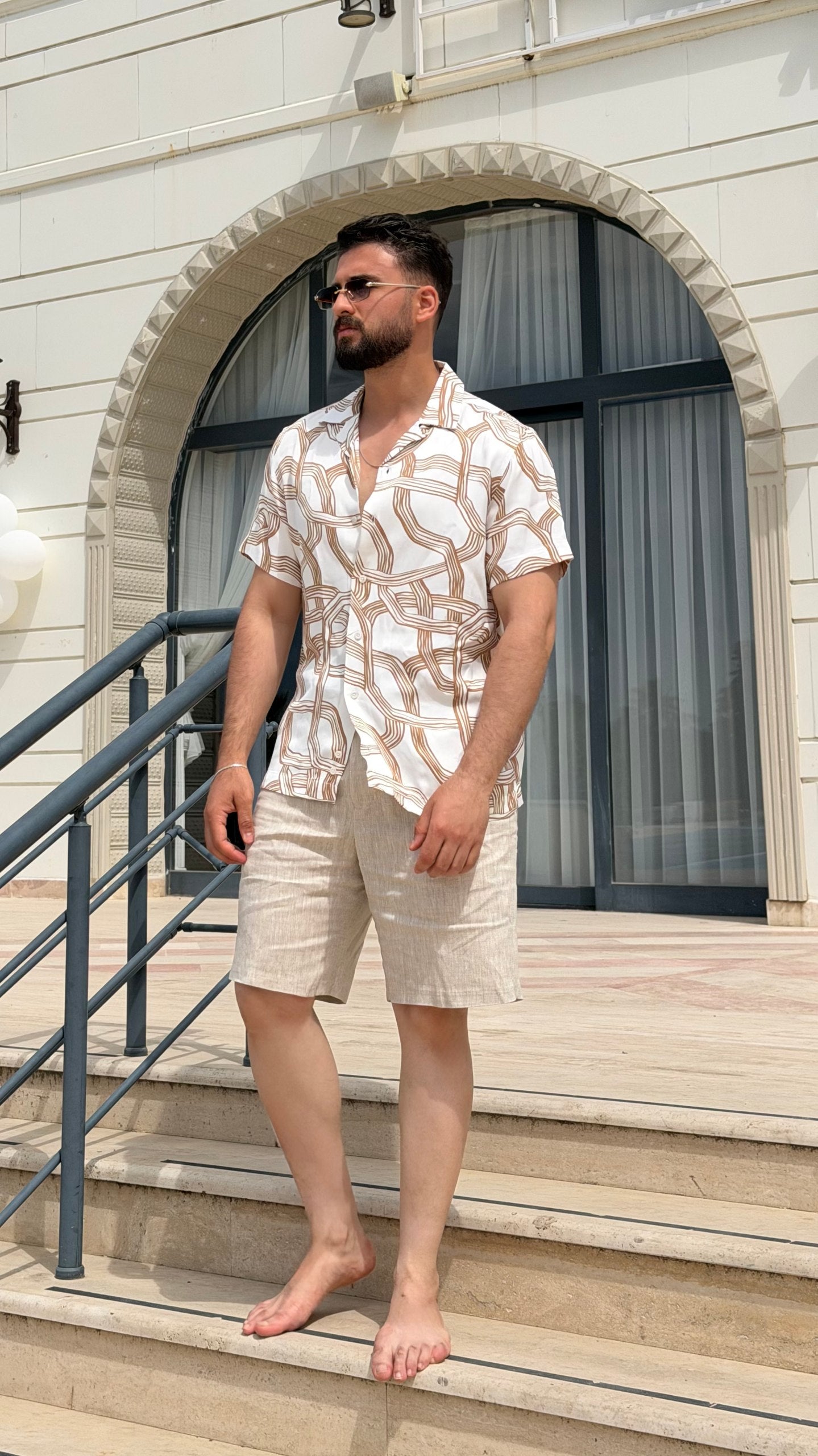 Men’s white brown abstract print short sleeve shirt with lightweight viscose fabric, button-front design, and modern summer casual style.