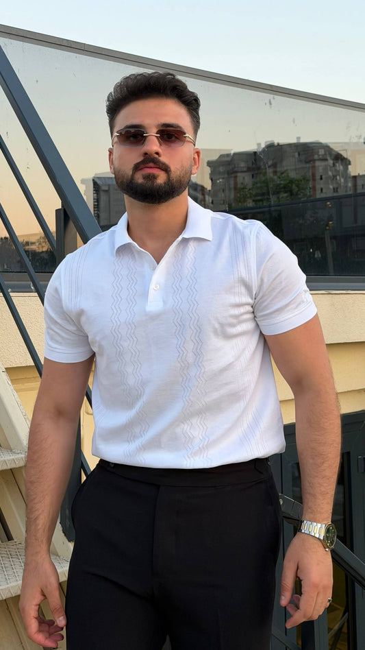 Men’s white knitted polo shirt with textured vertical detailing and smart casual style
