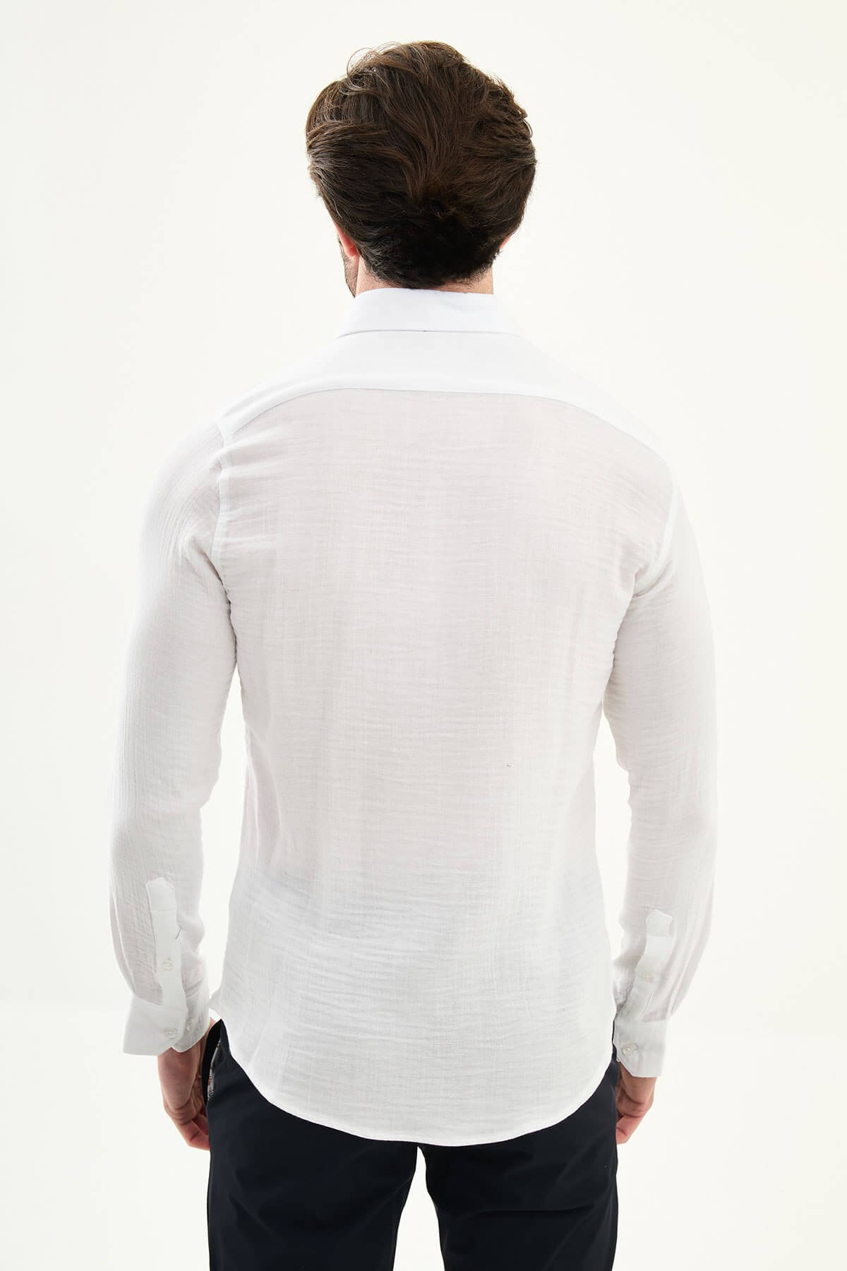 Men’s white linen-texture cotton long sleeve button-down shirt with lightweight breathable fabric and slim fit smart casual design for spring and summer wear.