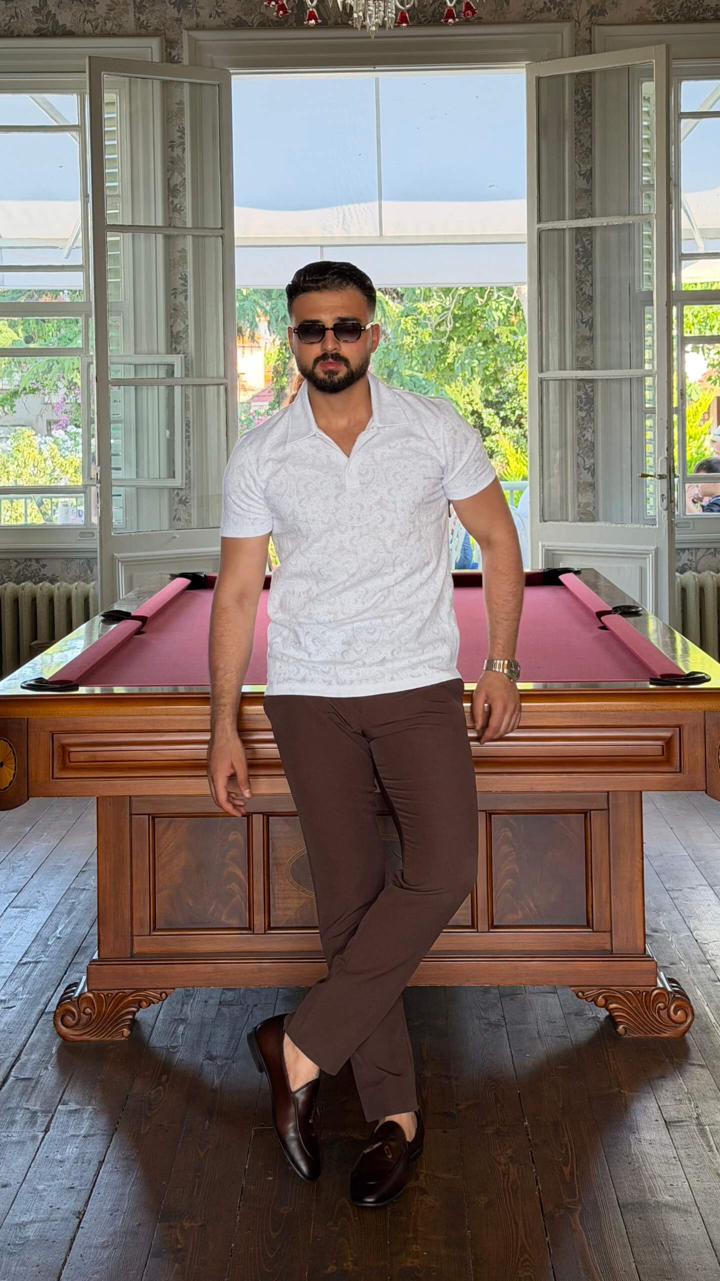 Men's white paisley jacquard polo shirt with textured pattern for summer style