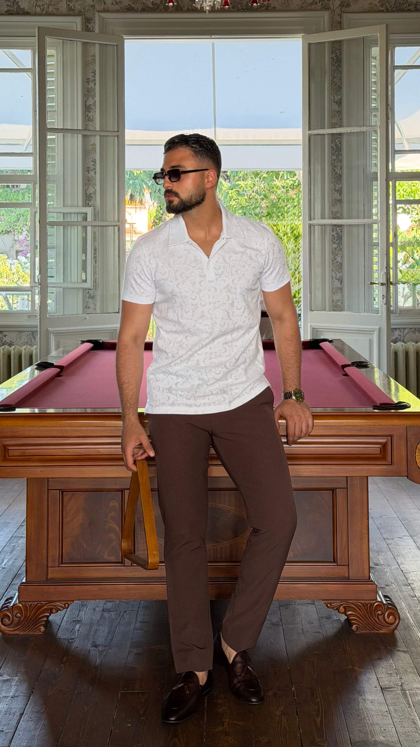 Men's white paisley jacquard polo shirt with textured pattern for summer style