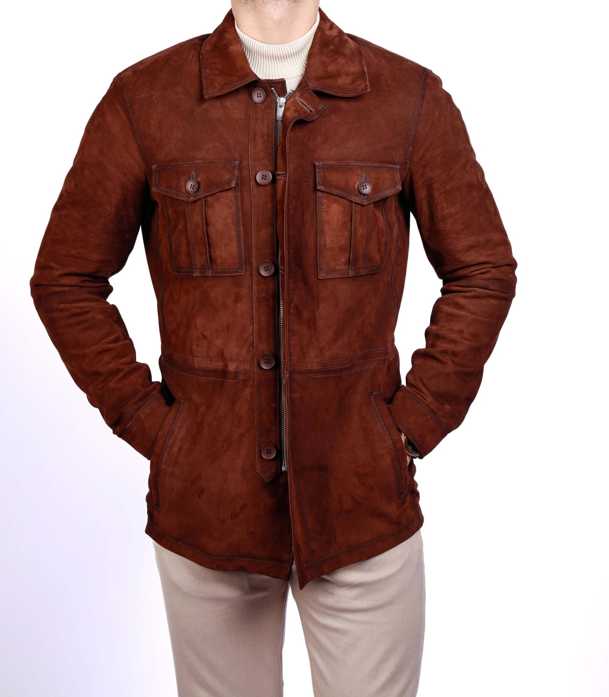 Men’s brown lamb leather suede field jacket with front pockets and button zip closure, worn over a light knit sweater.