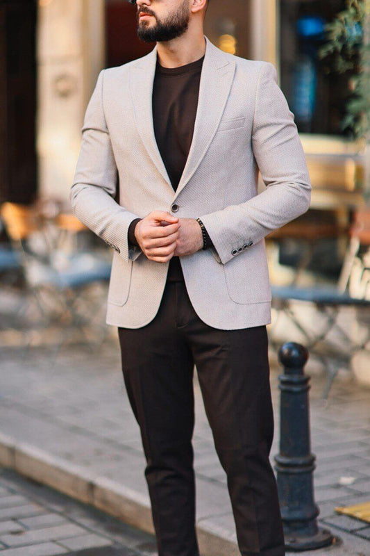 Men’s beige textured mono-collar slim-fit jacket paired with dark brown knit