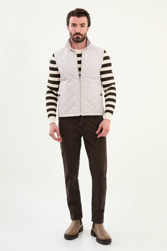 Light gray matte men’s technical utility vest with a stand collar, zip front, and two oversized snap-flap cargo pockets.