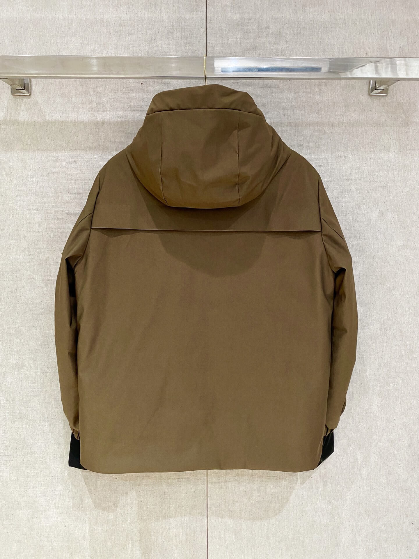 Brown ski down jacket with black insulated lining and hood, Moncler Grenoble-inspired design.