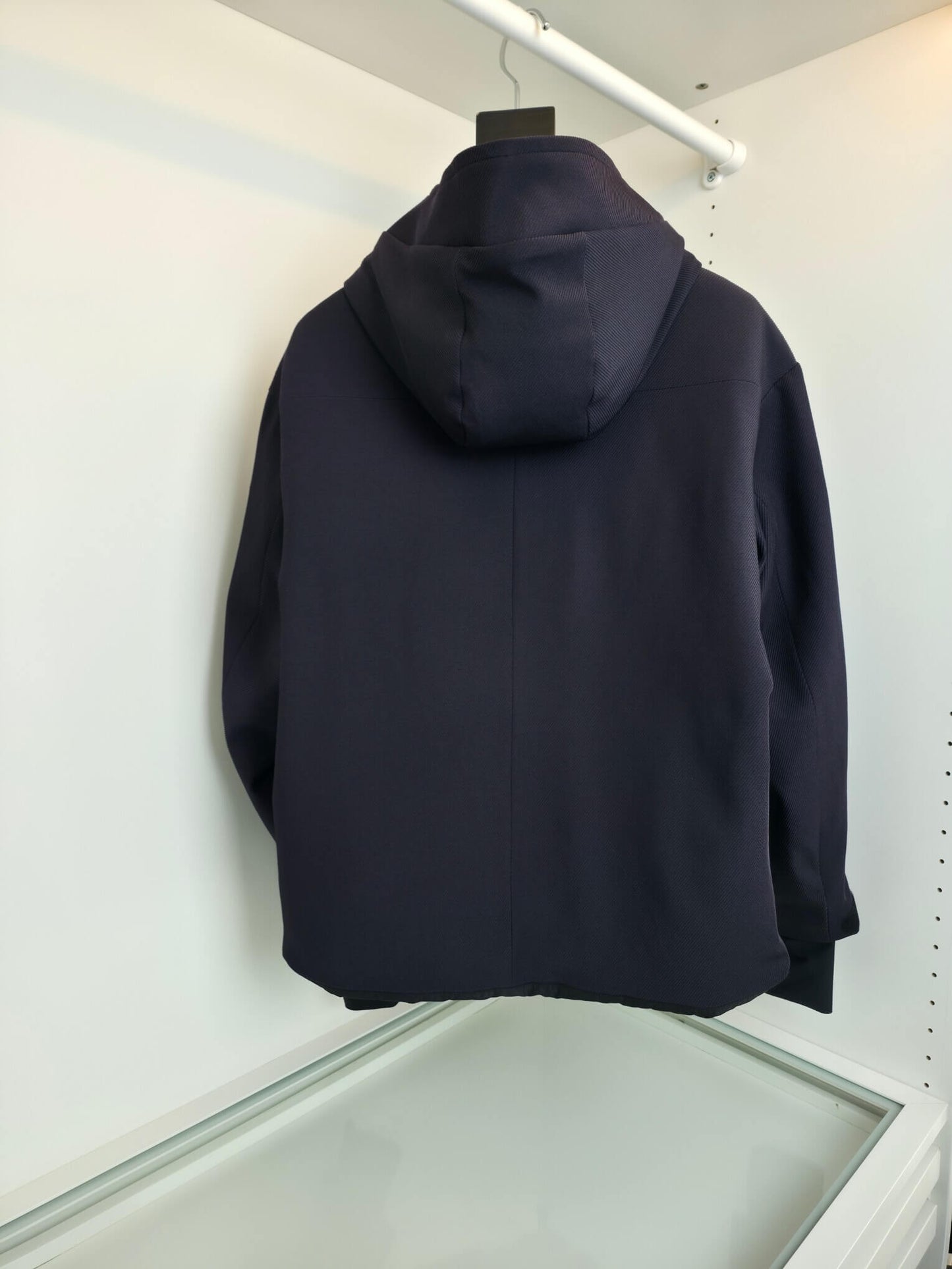 Navy hooded technical jacket with full zip closure and zippered pockets, Moncler-inspired design