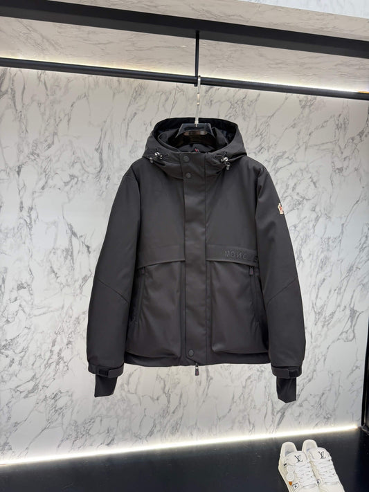 Moncler Maya Black Short Down Jacket open view showing quilted interior and label.