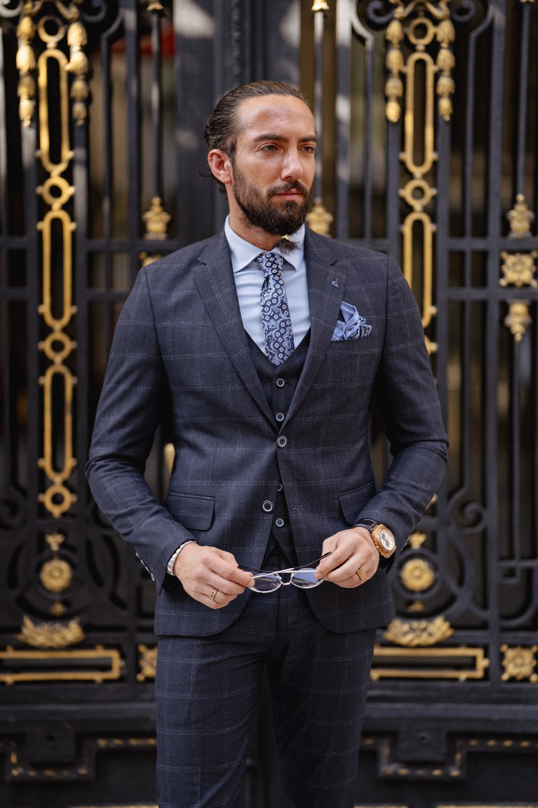 A Navy blue Slim Fit Plaid Detailed Suit on display.