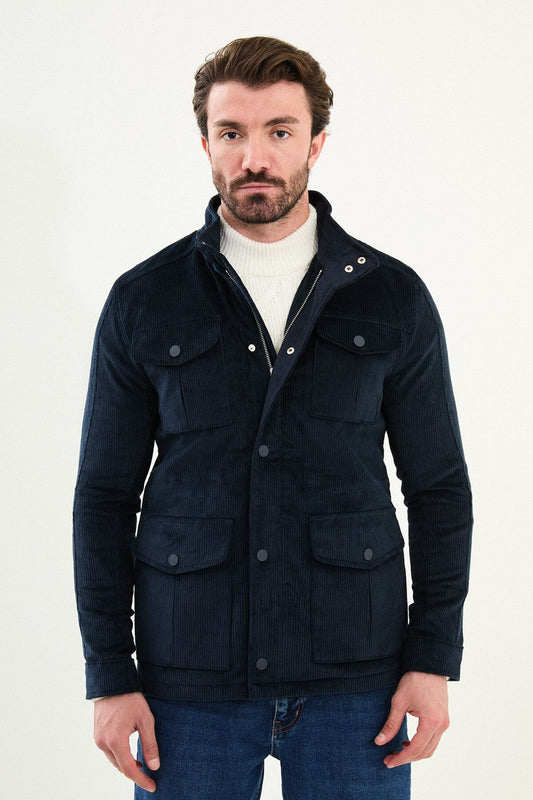 Men’s navy blue corduroy utility jacket with zip and button closure, multiple pockets, regular fit smart casual layering jacket styled with blue jeans and white knit sweater