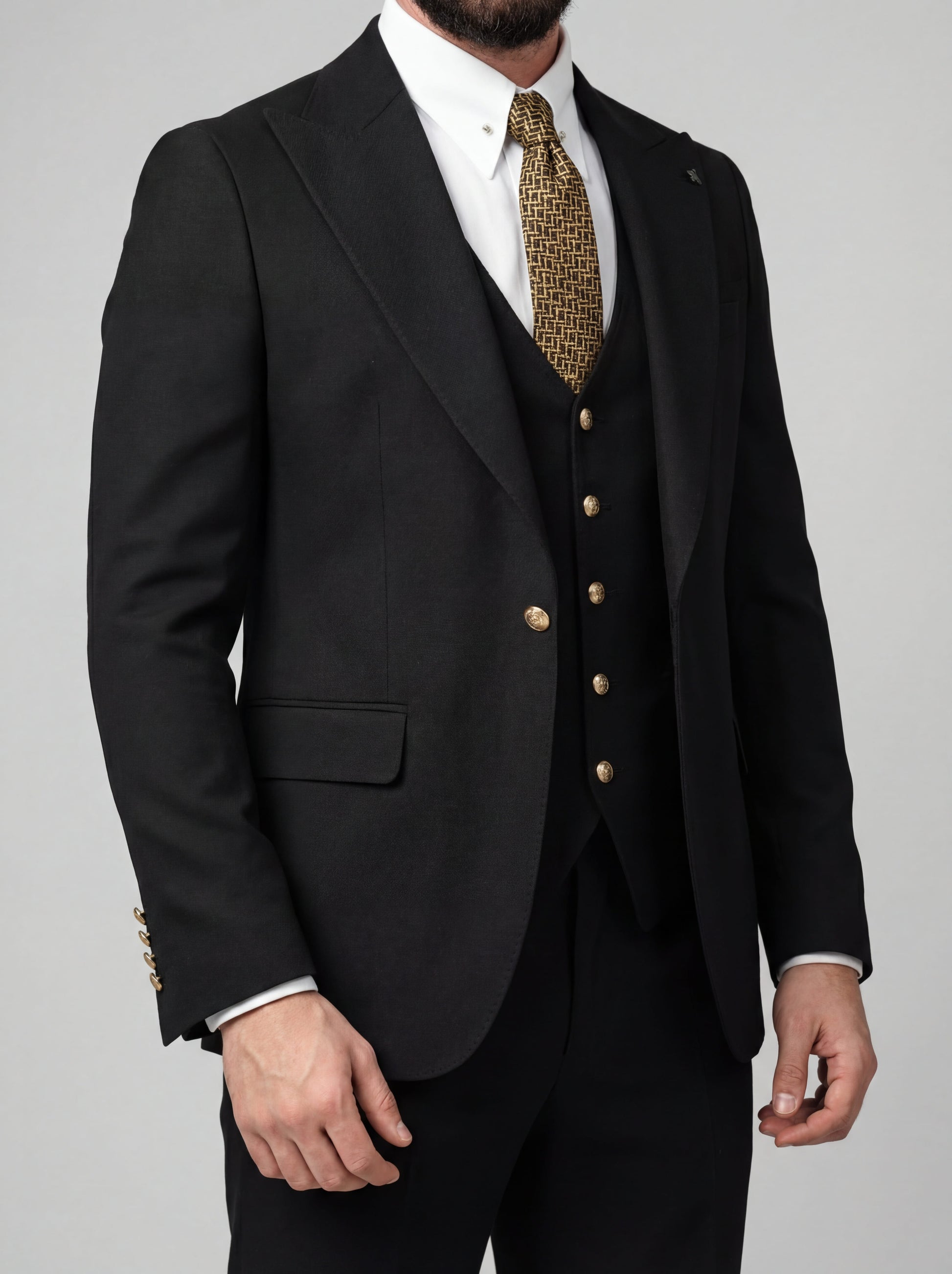 Model in Elegant Black Slim Fit 3-Piece Prom Suit standing outdoors with confident smile.