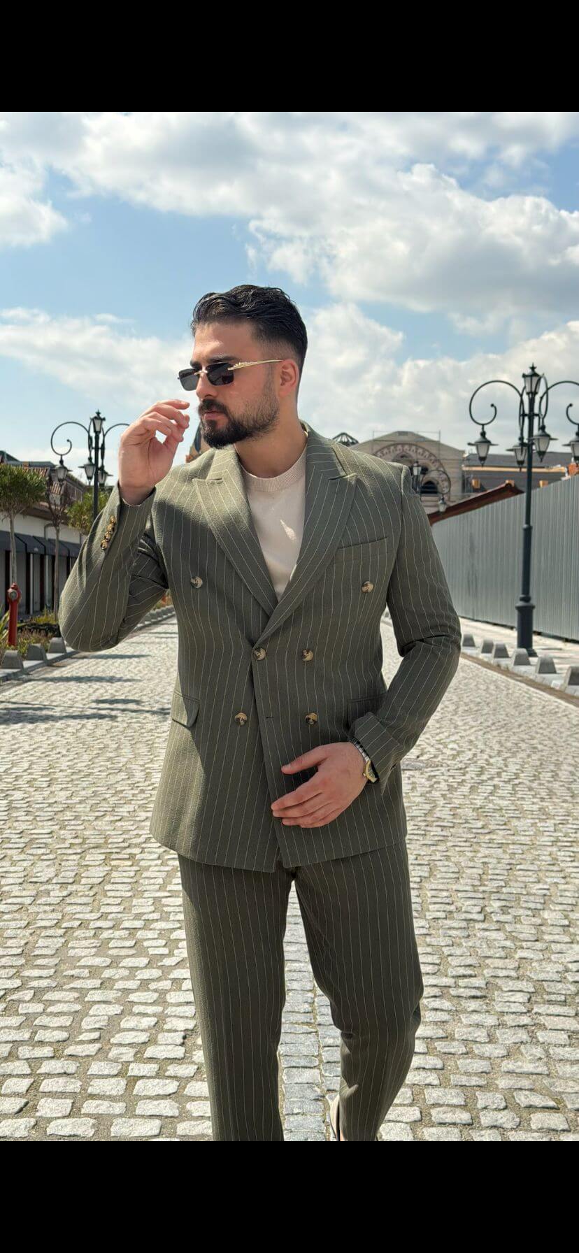 Men’s khaki pinstripe double-breasted slim fit suit with modern tailored design and lightweight breathable fabric