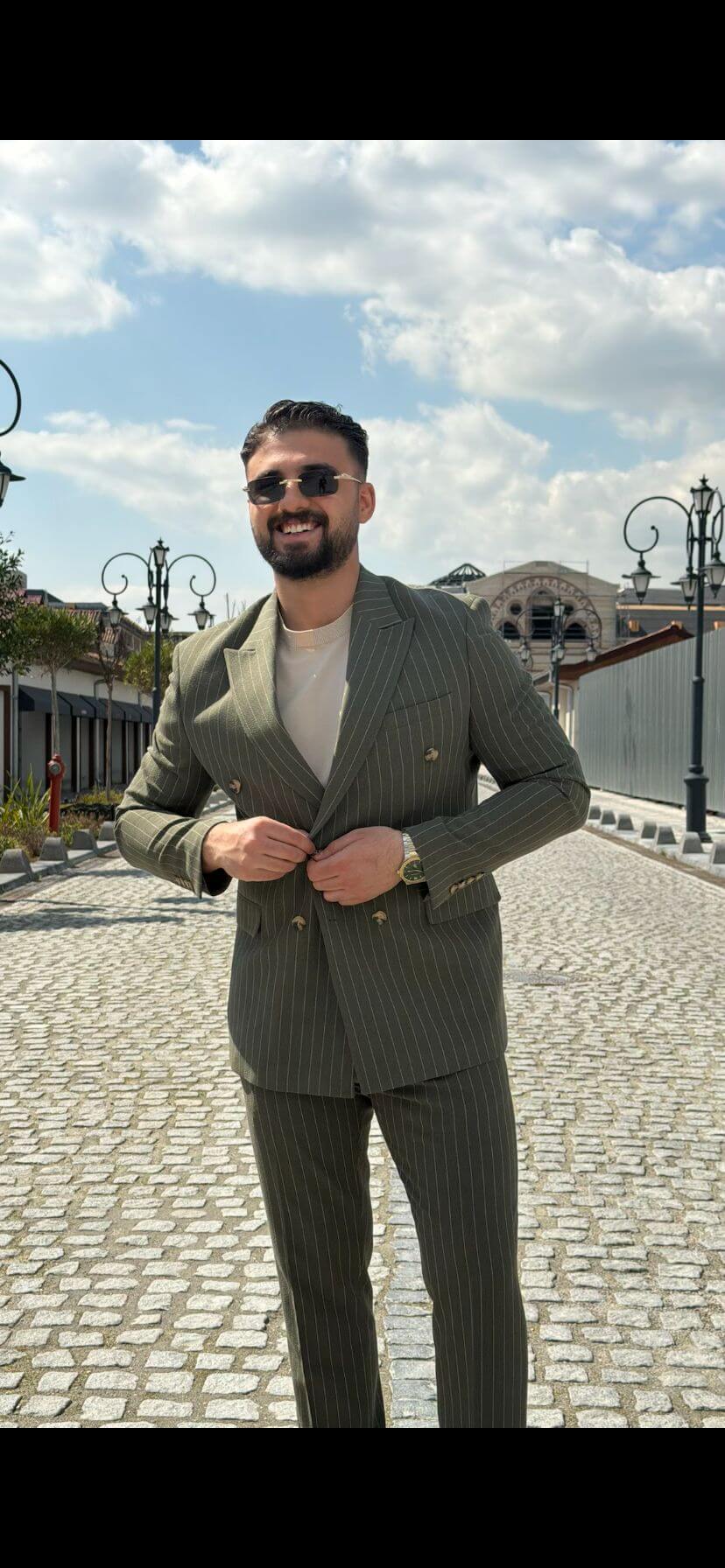 Men’s khaki pinstripe double-breasted slim fit suit with modern tailored design and lightweight breathable fabric