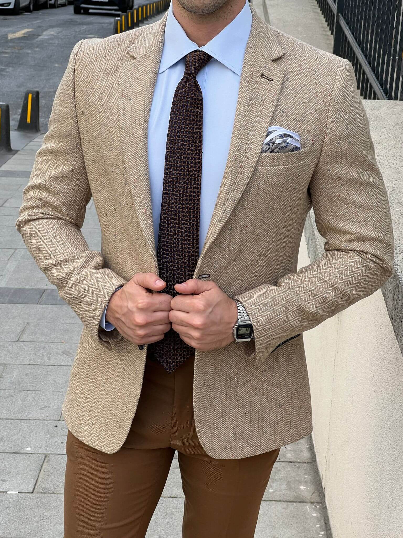 Embrace classic charm with our Beige blazer as showcased by our male model, embodying a perfect blend of style and sophistication.