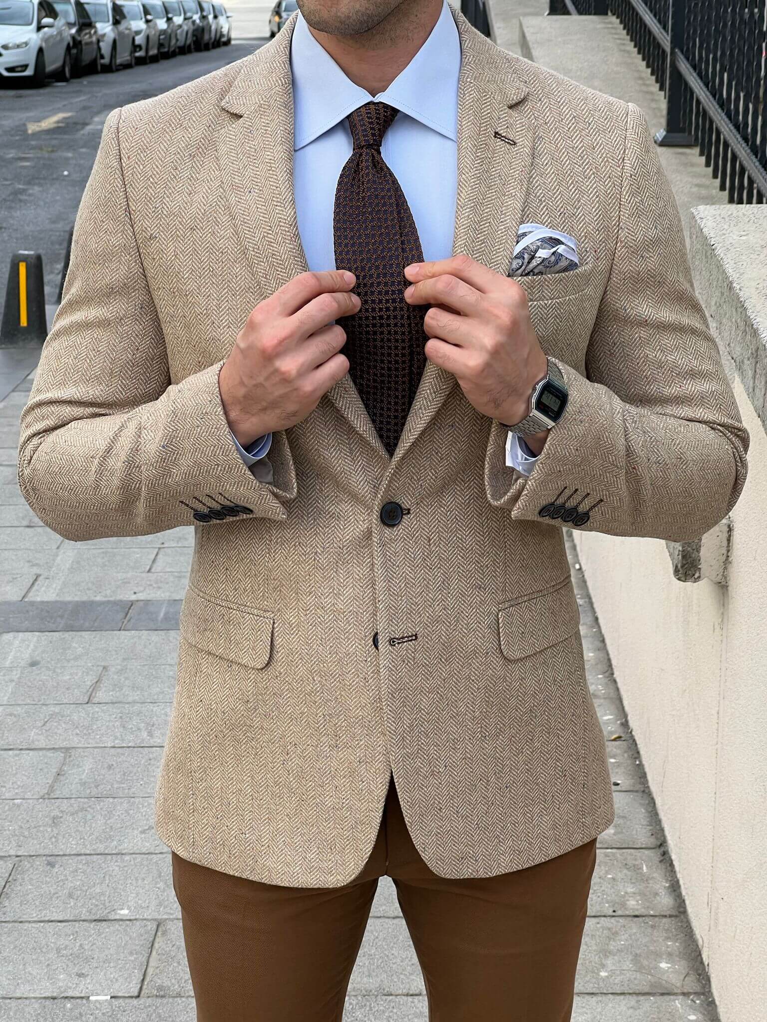 Embrace classic charm with our Beige blazer as showcased by our male model, embodying a perfect blend of style and sophistication.