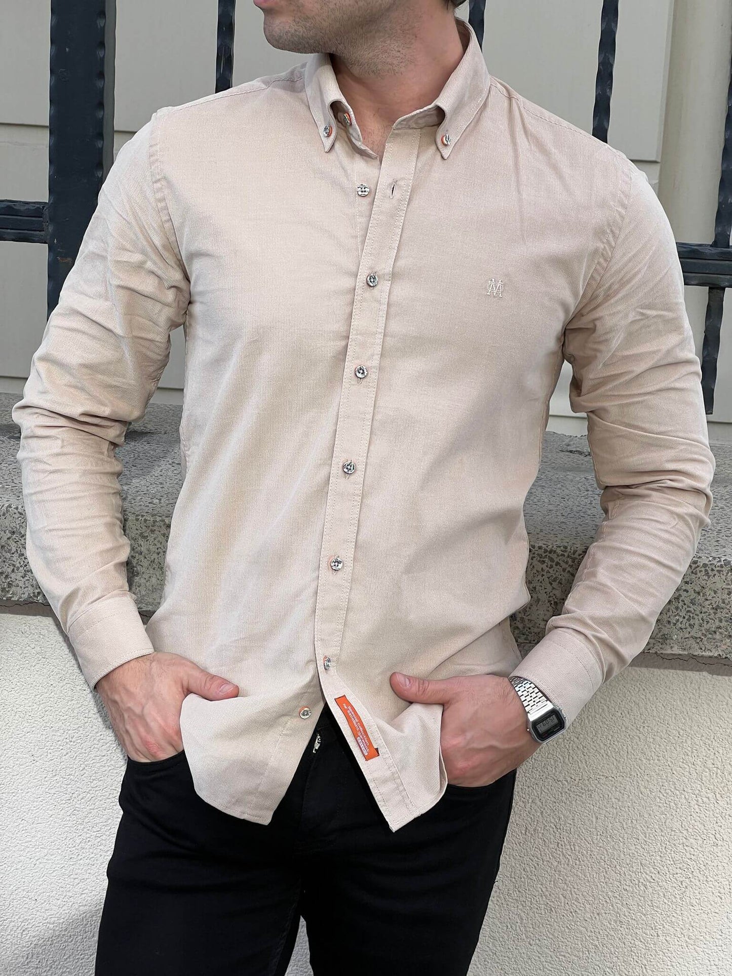 Our male model effortlessly flaunts the Velvet Beige Shirt, epitomizing refined style.