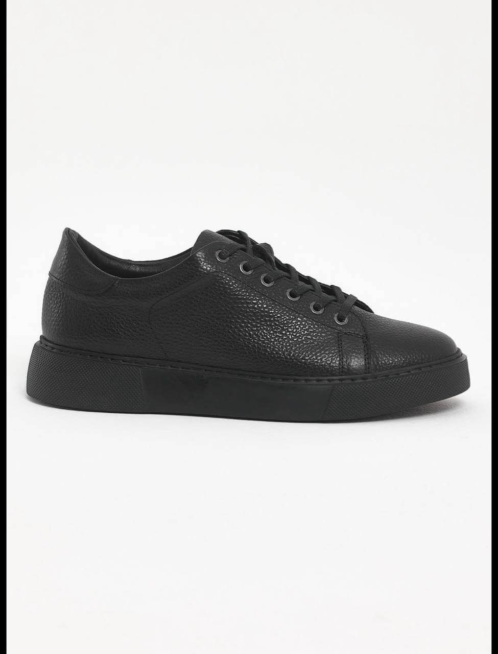 Black leather sneakers with textured floater leather and matching black EVA sole. 