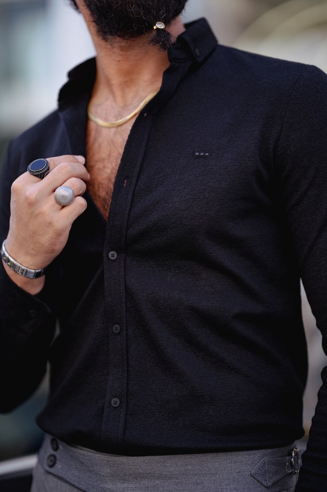 A Black Long Sleeve Shirt on display.