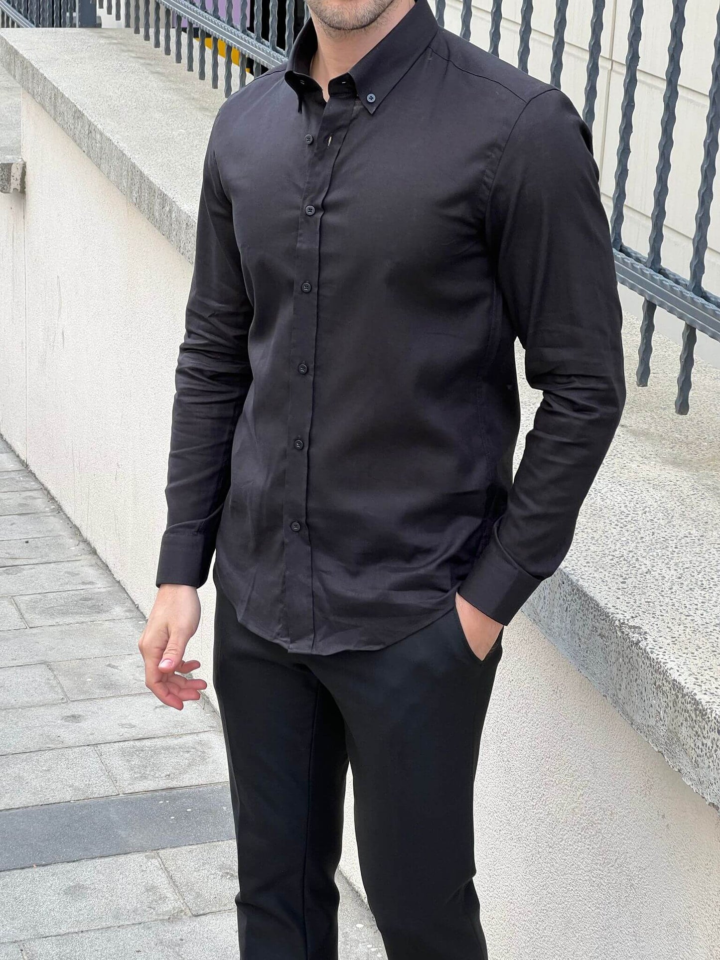 Captivating image of a male model in a black cotton shirt, highlighting comfort and elegance.