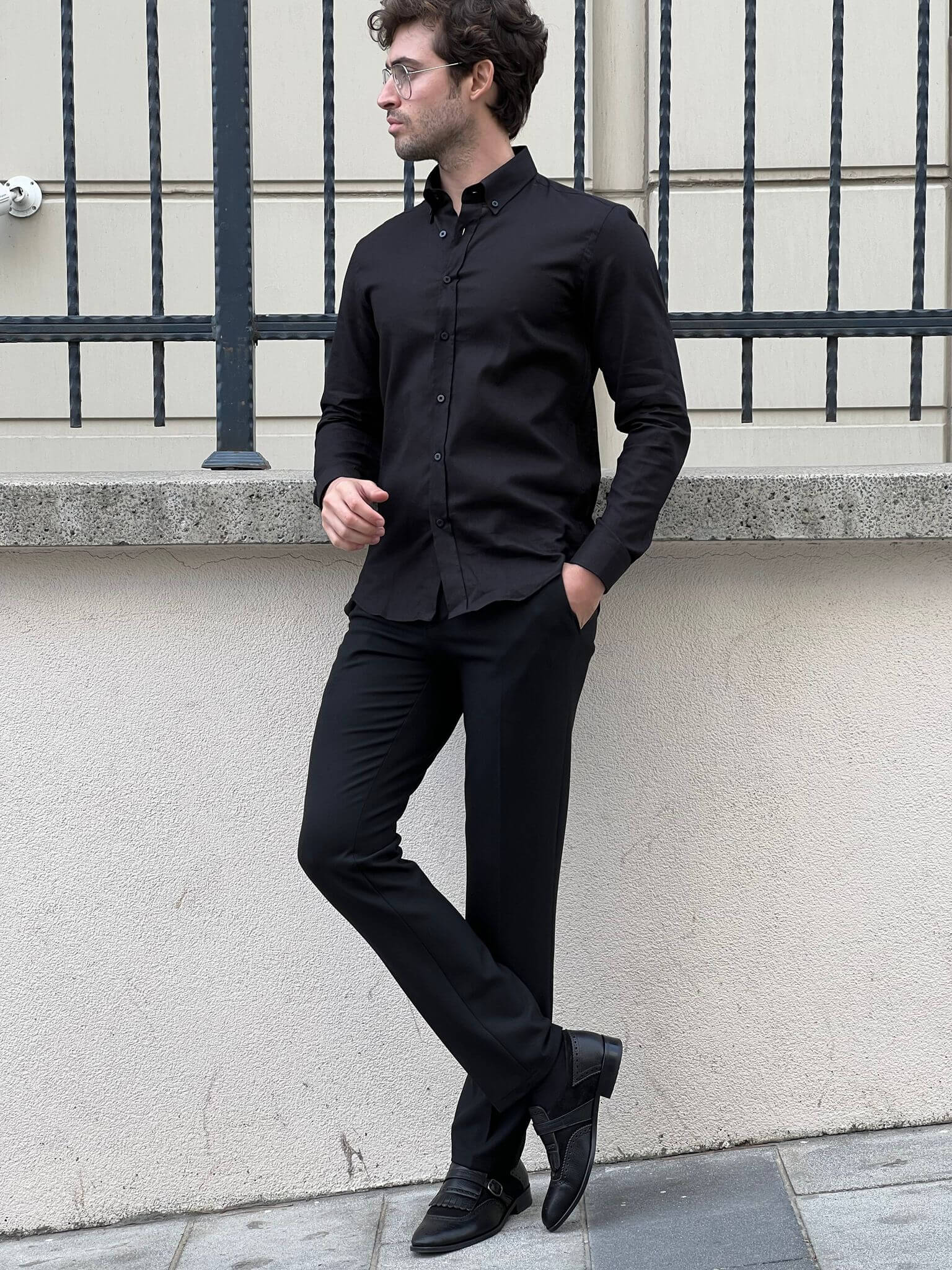 Captivating image of a male model in a black cotton shirt, highlighting comfort and elegance.