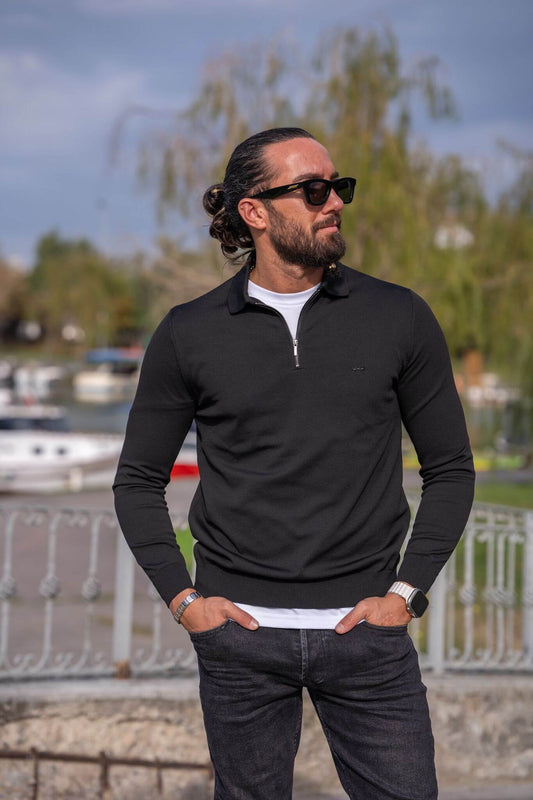 A male model wearing our Black Zipper Detailed Knitwear, exuding style and sophistication with a focus on the unique zipper