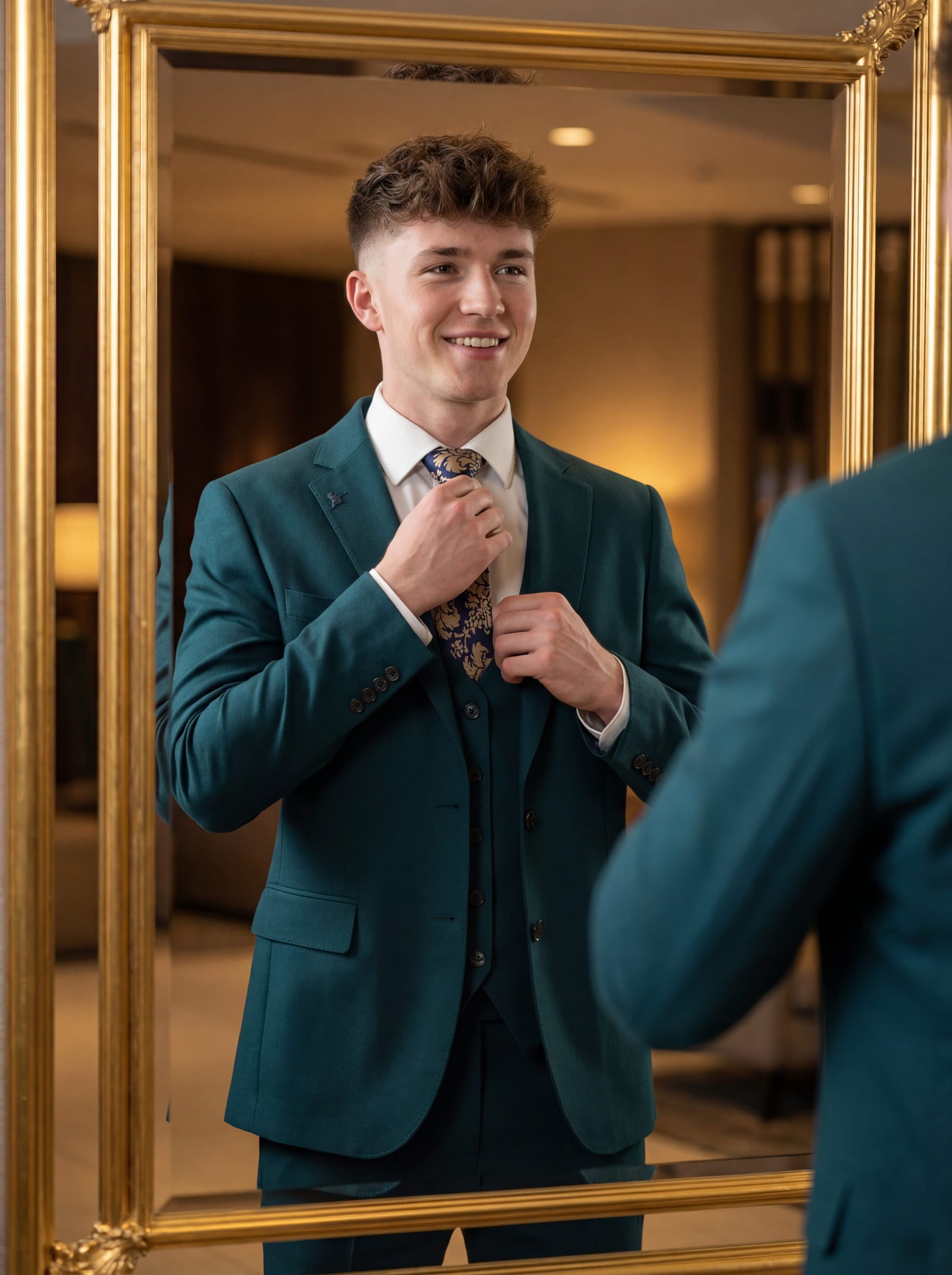 Emerald green slim fit three-piece prom suit styled for formal prom event