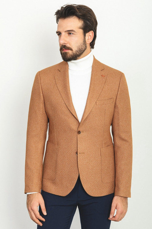 Model wearing a Classic Camel Blazer from HolloMen, showcasing a timeless and versatile style perfect for any occasion.