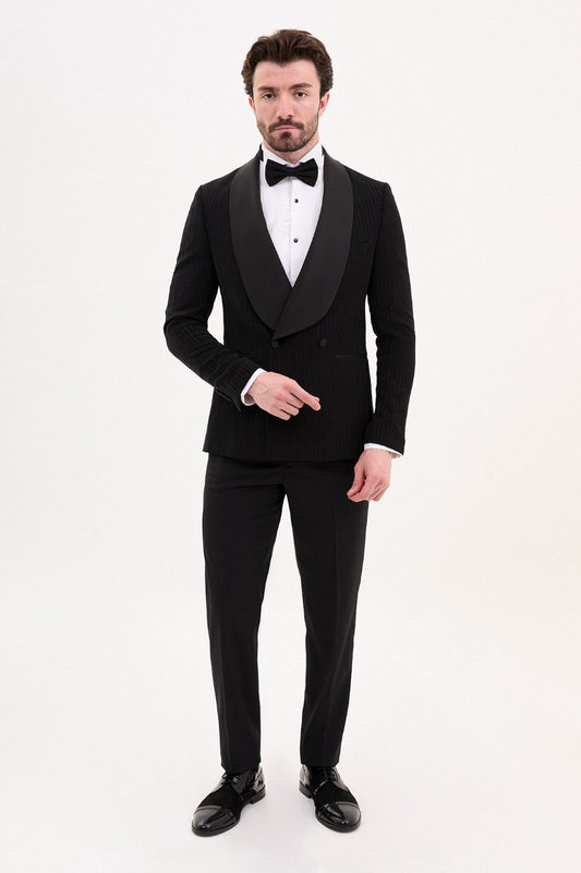 Model wearing a black shawl collar tuxedo from HolloMen, highlighting the refined and modern design perfect for formal events.