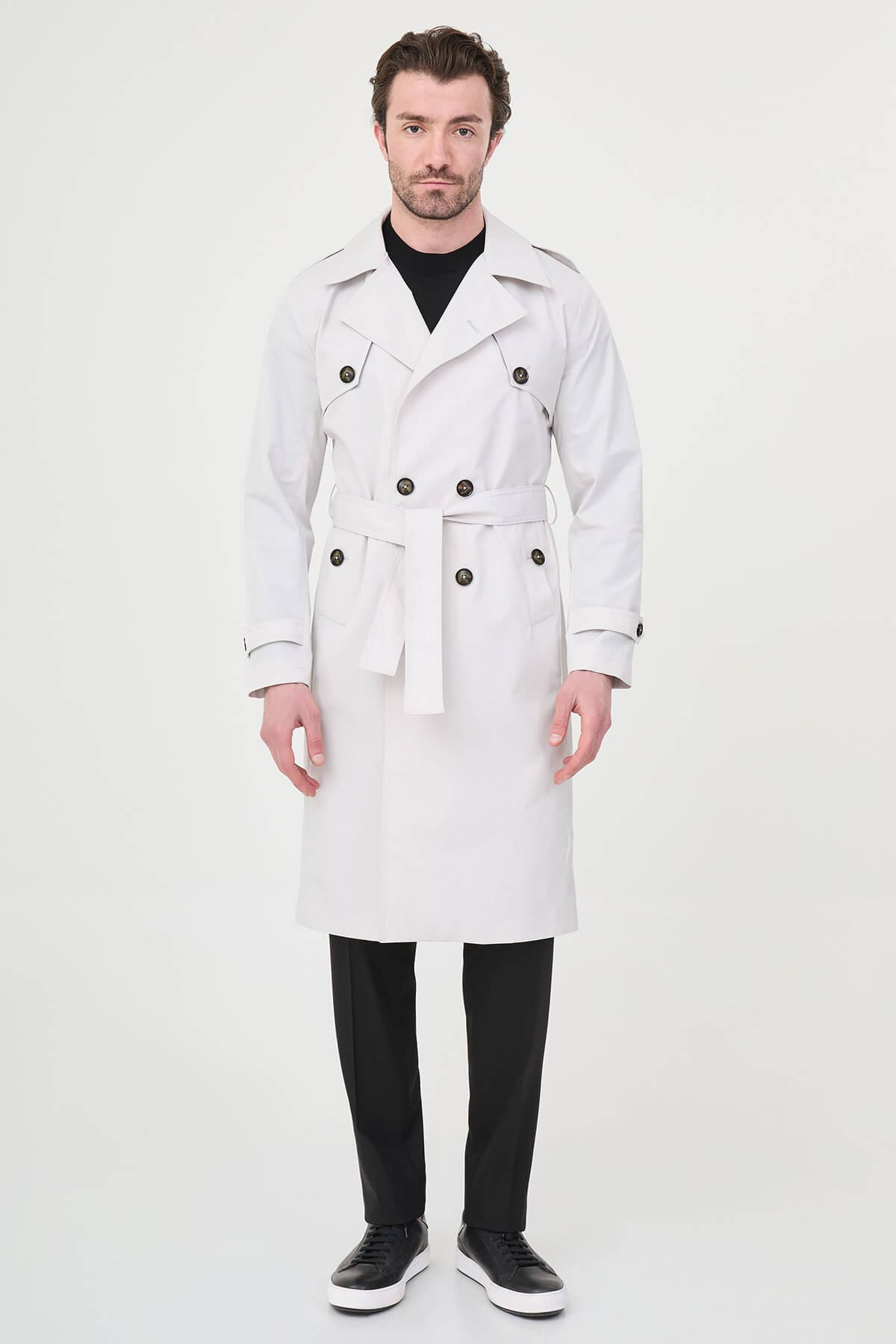 Men’s white double breasted trench coat with belt and tailored fit for fall winter fashion