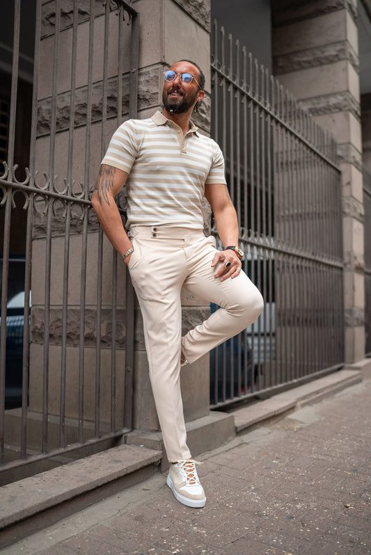 A Beige Striped Nile Polo Knitwear worn by a model
